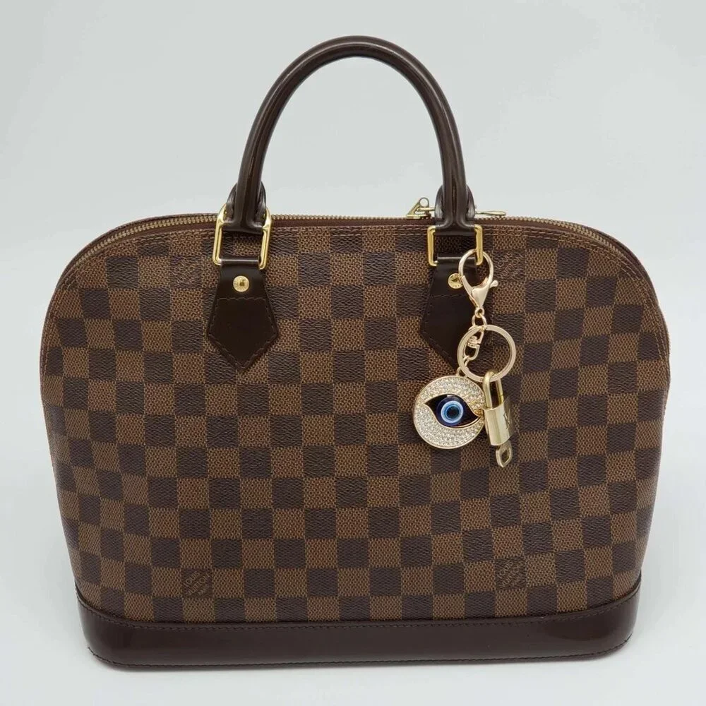 Authentic Louis Vuitton Lock & Key with unbranded Evil Eye Bagcharm, Keycharm - Picture 7 of 7